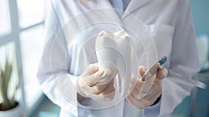 The dentist holding tooth model.AI generated image