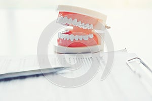 Dentist learning how to brush teeth