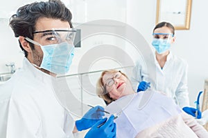 Dentist man in his surgery