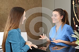Dentist or nurse attending a patient photo