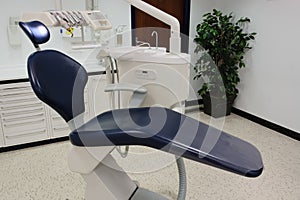 Dentist office wiht blue chair