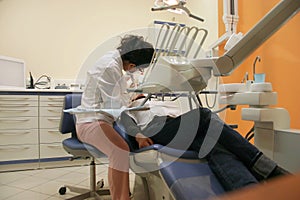 Dentist with patient photo