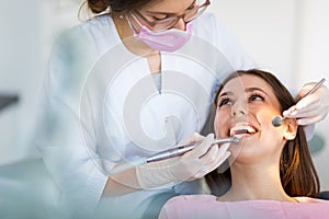 Dentist and patient in dentist office