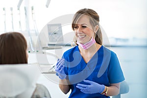 Dentist and patient in dentist office