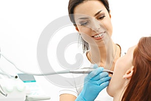 Dentist performing a dental procedure on patient