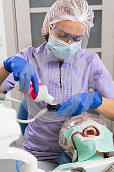 Dentist preparing ultrasonic device