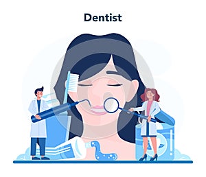 Dentist profession. Dentists in uniform treat tooth using