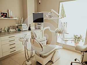 A dentist\'s clinic. Working armchair with utensils and tools