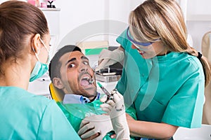 Dentist and scared patient