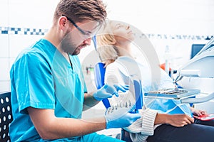 Dentist taking dentistry equipent