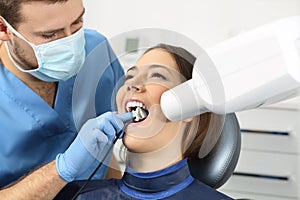 Dentist taking a teeth radiography photo