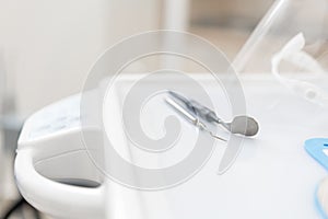 Dentist tool probe and mirror. . Stomatological instrument in the dentist clinic. Dental work in clinic. Office where