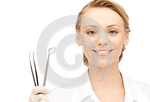 Dentist with tools