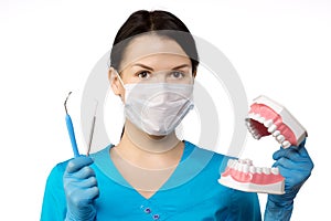 Dentist with tools. Dentist. The concept of dentistry, whitening