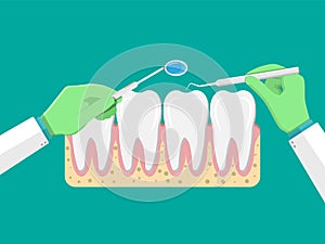 Dentist with tools examines teeth.