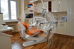 A dentist utilizes modern equipment, like an intraoral scanner or digital X-ray machine.