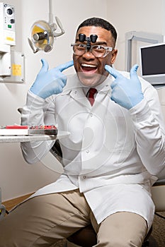 Dentist wearing dental binocular loupes