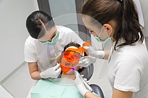 Dentist whiten your teeth his patient photo
