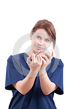 Dentist woman holding syringe and anesthetic photo