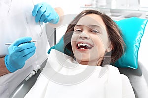 Dentistry, joyful child in the dental chair