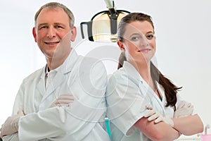 Dentists in their surgery