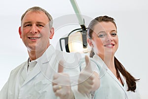 Dentists in their surgery