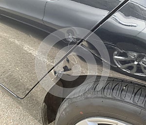 Dents and scrapes in Paint on an vehicle