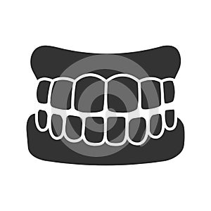 Dentures glyph icon