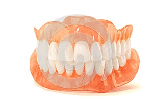 dentures. Isolate on white background acrylic prosthesis of human jaws. The concept of orthopedic dentistry