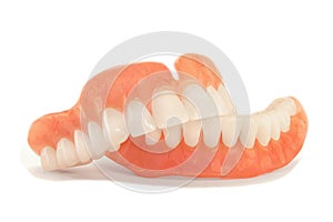 dentures. Isolate on white background acrylic prosthesis of human jaws. The concept of orthopedic dentistry