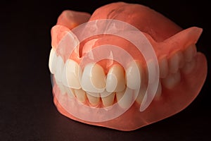 dentures. Isolate on white background acrylic prosthesis of human jaws. The concept of orthopedic dentistry