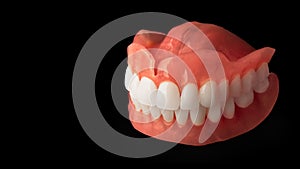 dentures. Isolate on white background acrylic prosthesis of human jaws. The concept of orthopedic dentistry