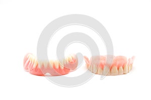 Dentures isolated on a white background. Denture, close up