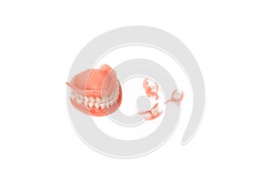 Dentures on a white background. Close-up of dentures. Dentistry is conceptual photography. Prosthetic dentistry. False teeth.