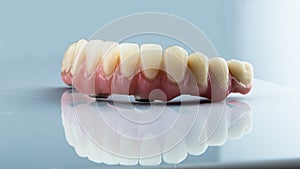 Dentures on a white background, dental implants