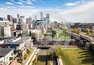 Denver cityscape aerial view with bridges over cherry creek rive