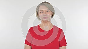 Denying Old Woman Shaking Head in Rejection on White Background