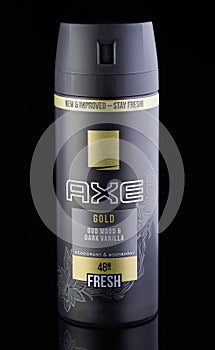 Deodorant for men on a black background with reflection