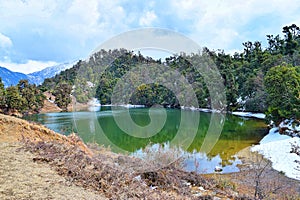 Deoria or Deoriya Tal Lake - Half with and Half without Snow - Winter Himalayan Landscape, Uttarakhand, India