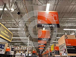 The department signs hanging from the ceiling at Home Depot home improvement store