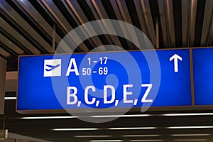 Departure gate and terminal sign in international airport