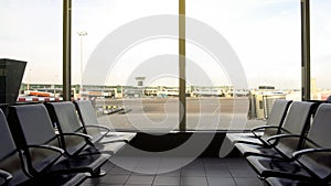 Departure lounge with empty seats, airport terminal, modern transport building