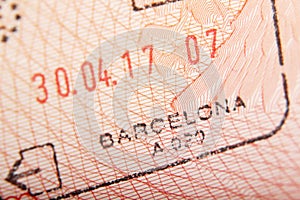 Departure stamp in a passport from Barcelona airport