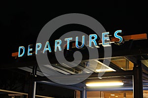 Departures Sign at Night