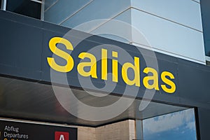 Departures spanish: Salidas gate sign at Airport photo