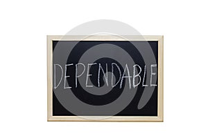 DEPENDABLE written with white chalk on blackboard