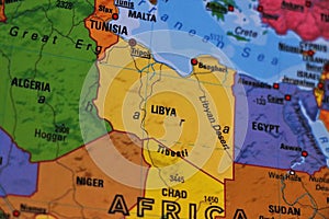 Close up of a map with Libya in the foreground.