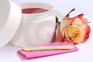 Depilation set: wax container, stick and rose