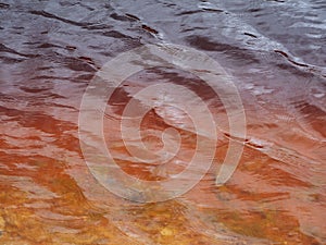 A deposit of refractory clay. A quarry for the extraction of natural resources