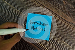 Depreciation Methods write on sticky notes  on Wooden Table